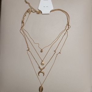 Gold four layer necklace brand new